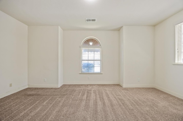 5929 N La Paz Ave, Fresno, CA 93723 - empty room with light colored carpet and baseboards