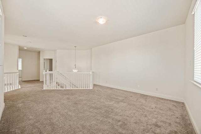 5929 N La Paz Ave, Fresno, CA 93723 - spare room featuring light colored carpet and healthy amount of natural light