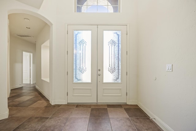 5929 N La Paz Ave, Fresno, CA 93723 - foyer entrance featuring arched walkways and french doors
