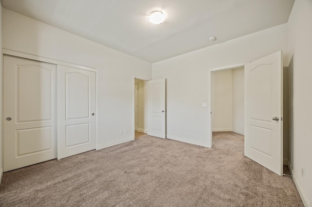 5929 N La Paz Ave, Fresno, CA 93723 - unfurnished bedroom with light carpet and a closet