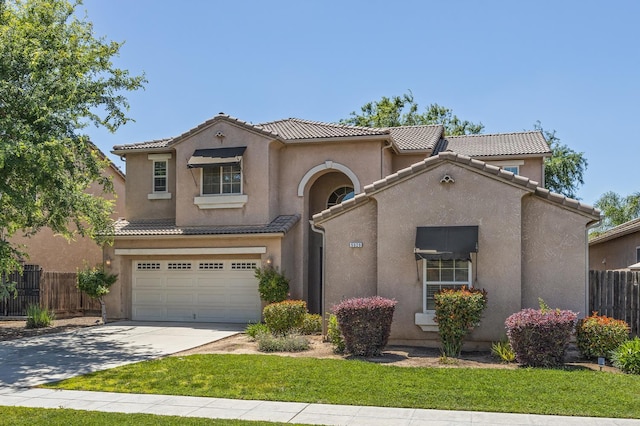 5929 N La Paz Ave, Fresno, CA 93723 - mediterranean / spanish house with concrete driveway, a tiled roof, stucco siding, and an attached garage