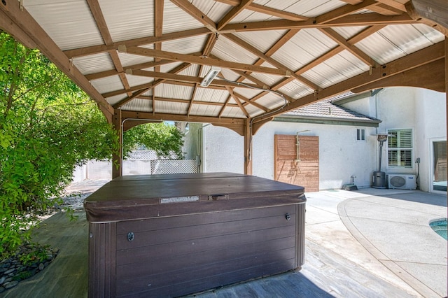 218 W Hubert Ct, Fresno, CA 93711 - view of patio / terrace with a hot tub and a gazebo