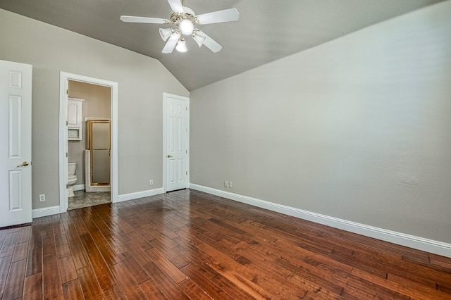 218 W Hubert Ct, Fresno, CA 93711 - unfurnished bedroom featuring lofted ceiling, dark wood finished floors, ensuite bathroom, and a ceiling fan