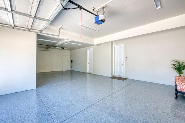 218 W Hubert Ct, Fresno, CA 93711 - garage featuring a garage door opener