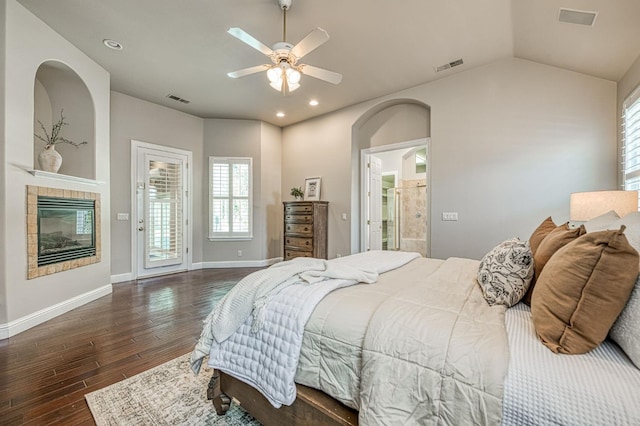 218 W Hubert Ct, Fresno, CA 93711 - bedroom with dark wood finished floors, access to outside, multiple windows, recessed lighting, and a tile fireplace