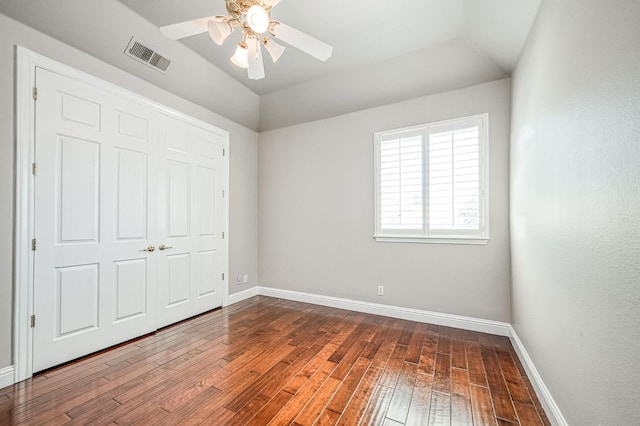 218 W Hubert Ct, Fresno, CA 93711 - unfurnished bedroom with wood-type flooring, vaulted ceiling, a ceiling fan, and a closet