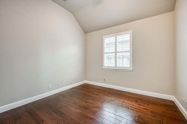 218 W Hubert Ct, Fresno, CA 93711 - spare room featuring vaulted ceiling and dark wood-style floors