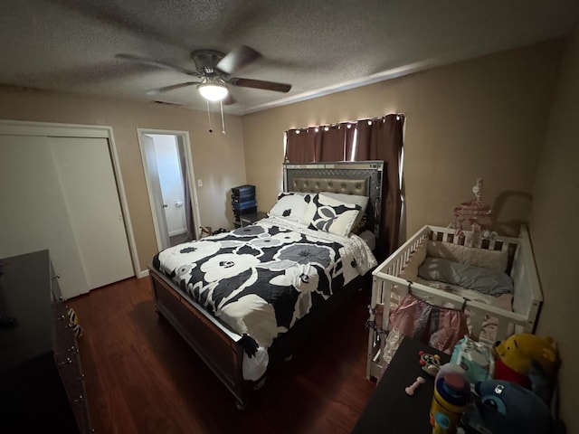 4615 E Hamilton Ave E, Fresno, CA 93702 - bedroom featuring a textured ceiling, wood finished floors, and ceiling fan