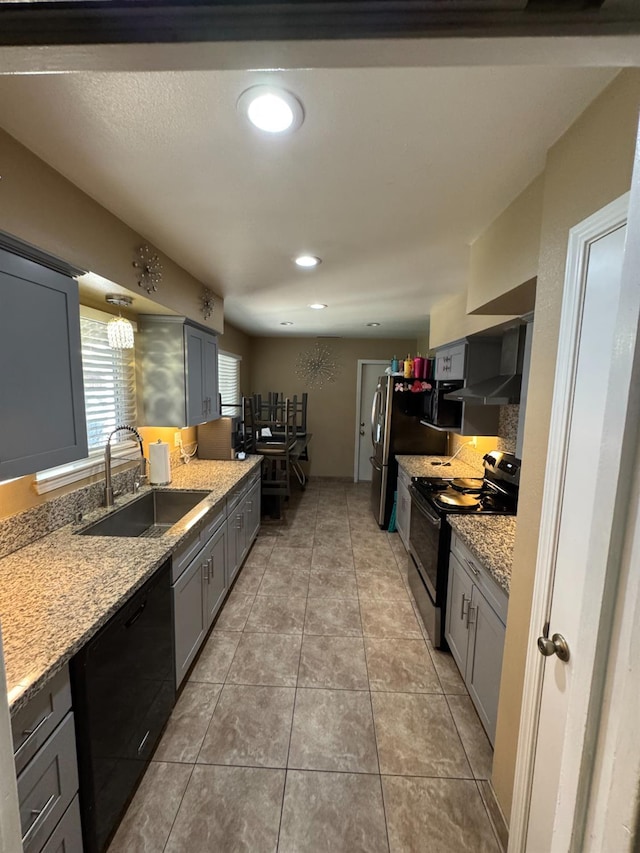 4615 E Hamilton Ave E, Fresno, CA 93702 - kitchen with electric range oven, dishwasher, gray cabinetry, light stone counters, and recessed lighting