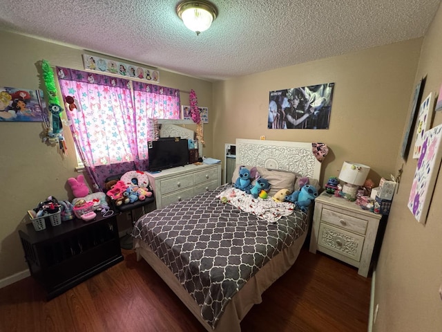 4615 E Hamilton Ave E, Fresno, CA 93702 - bedroom with wood finished floors and a textured ceiling