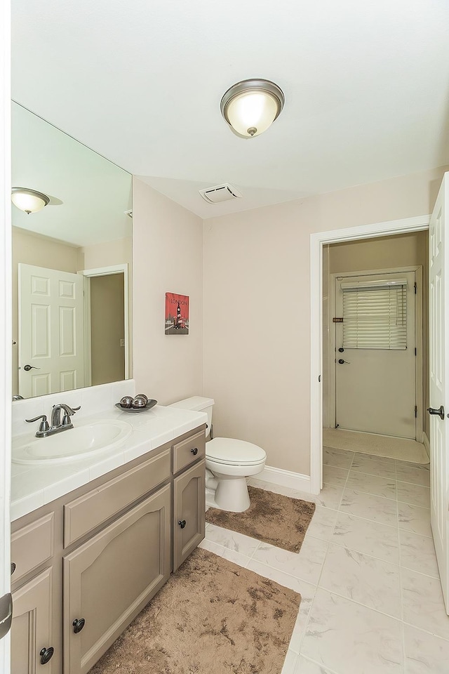4950 W Minarets Ave, Fresno, CA 93722 - bathroom featuring vanity and toilet
