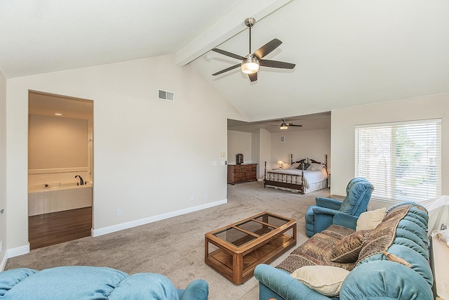4950 W Minarets Ave, Fresno, CA 93722 - living room with a ceiling fan, carpet floors, beamed ceiling, and high vaulted ceiling