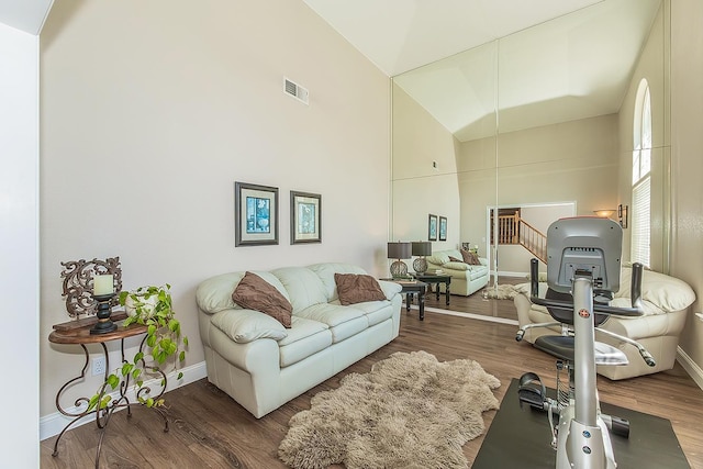 4950 W Minarets Ave, Fresno, CA 93722 - living room with high vaulted ceiling and wood finished floors