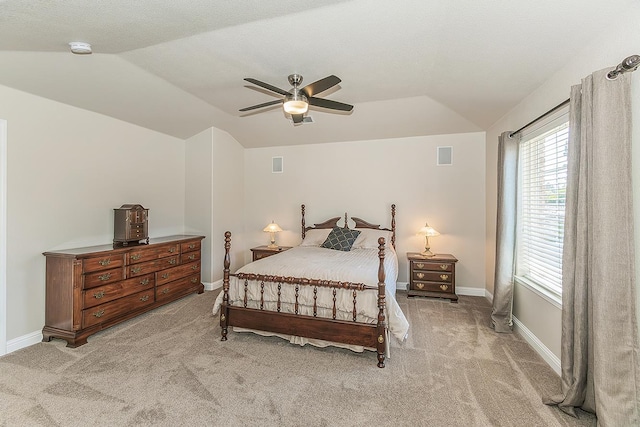 4950 W Minarets Ave, Fresno, CA 93722 - bedroom with vaulted ceiling, carpet flooring, and a ceiling fan