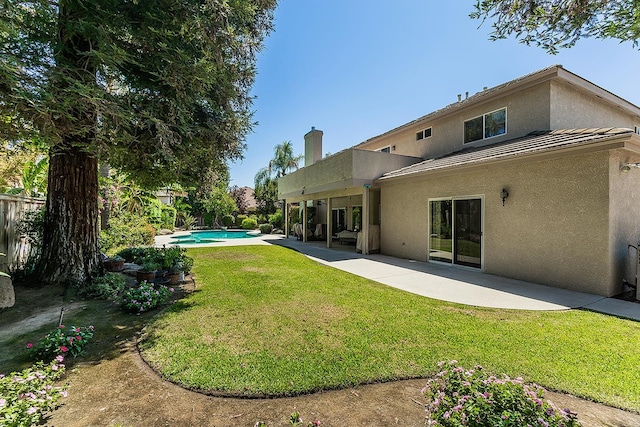 4950 W Minarets Ave, Fresno, CA 93722 - view of yard featuring an outdoor pool, a patio area, and a balcony