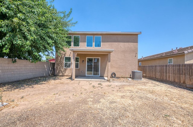 2354 S Garden, Fresno, CA 93725 - rear view of property featuring stucco siding, a fenced backyard, and a patio