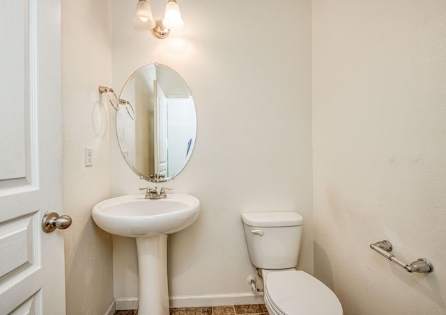 2354 S Garden, Fresno, CA 93725 - bathroom featuring toilet and a sink