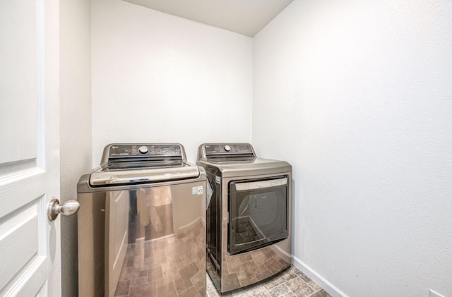 2354 S Garden, Fresno, CA 93725 - laundry area featuring washer and clothes dryer and baseboards
