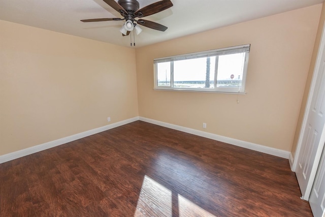 5942 S Cedar Ave, Fresno, CA 93725 - empty room featuring dark wood-style flooring and a ceiling fan