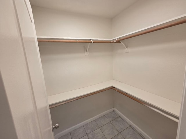 6173 N Marty Ave, Fresno, CA 93711 - walk in closet with light tile patterned flooring