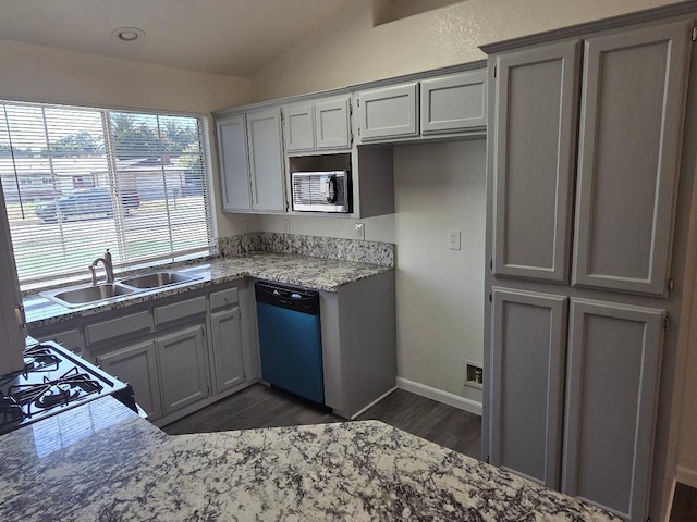 6173 N Marty Ave, Fresno, CA 93711 - kitchen with dishwasher, dark wood-style floors, gray cabinets, stainless steel microwave, and vaulted ceiling