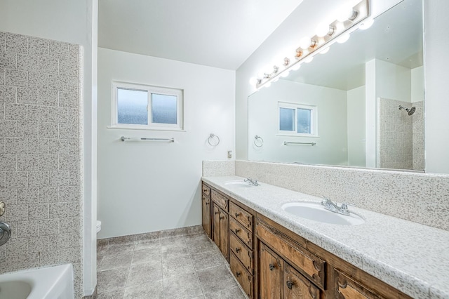 7343 N 4th St, Fresno, CA 93720 - full bathroom featuring double vanity, shower / washtub combination, and tile patterned flooring