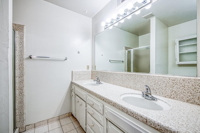 7343 N 4th St, Fresno, CA 93720 - full bath with double vanity, tile patterned floors, and a shower stall
