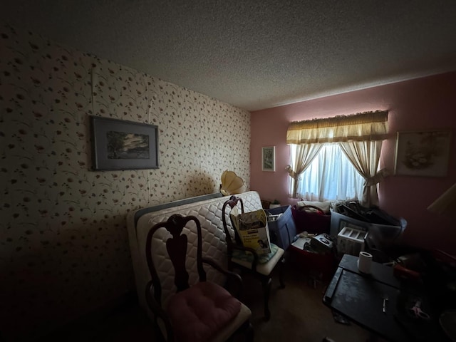 3635 W Cortland Ave, Fresno, CA 93722 - sitting room featuring a textured ceiling, carpet flooring, and wallpapered walls