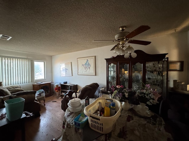 3635 W Cortland Ave, Fresno, CA 93722 - living room with a textured ceiling and ceiling fan