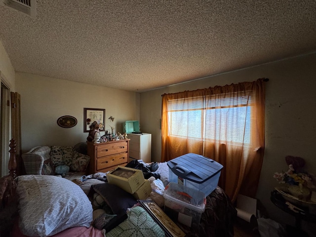 3635 W Cortland Ave, Fresno, CA 93722 - bedroom featuring a textured ceiling