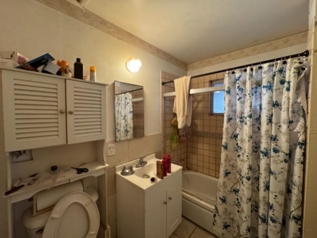 3635 W Cortland Ave, Fresno, CA 93722 - bathroom featuring vanity, shower / bath combo, and tile patterned flooring