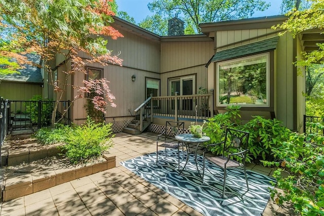 36522 Mudge Ranch Rd, Coarsegold, CA 93614 - back of house with a chimney and a patio area