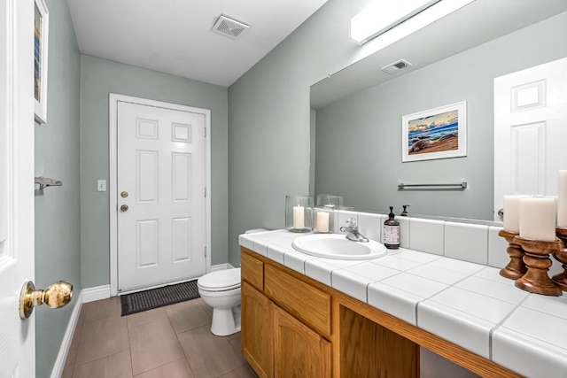 6421 S Greenwood Ave, Del Rey, CA 93616 - bathroom with vanity and tile patterned floors