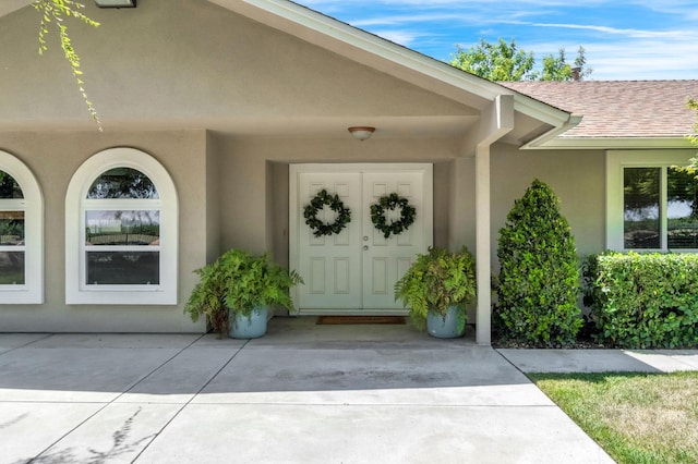 6421 S Greenwood Ave, Del Rey, CA 93616 - property entrance with a shingled roof and stucco siding