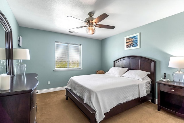 6421 S Greenwood Ave, Del Rey, CA 93616 - carpeted bedroom with baseboards and a ceiling fan