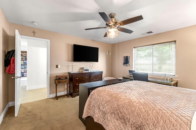 6421 S Greenwood Ave, Del Rey, CA 93616 - bedroom with light colored carpet and a ceiling fan