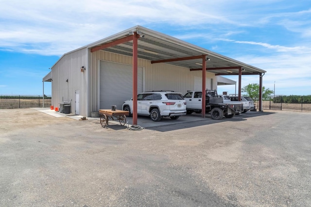 6421 S Greenwood Ave, Del Rey, CA 93616 - view of car parking with a detached garage