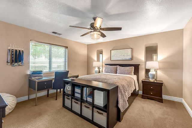 6421 S Greenwood Ave, Del Rey, CA 93616 - bedroom with light colored carpet, a textured ceiling, and a ceiling fan