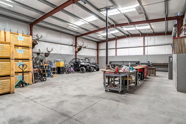 6421 S Greenwood Ave, Del Rey, CA 93616 - garage featuring a workshop area