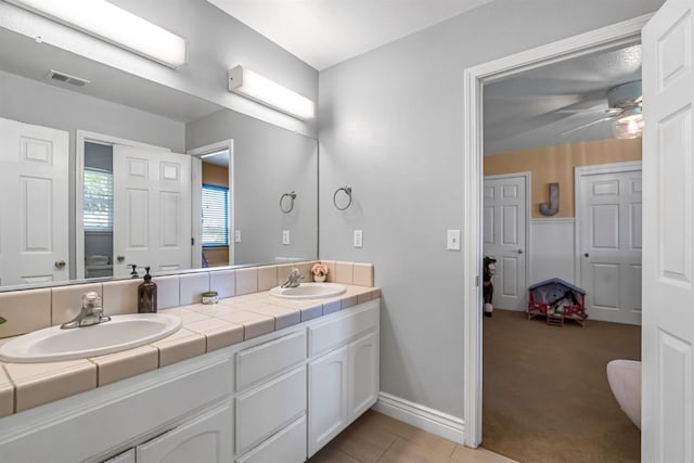 6421 S Greenwood Ave, Del Rey, CA 93616 - full bath with double vanity and a ceiling fan