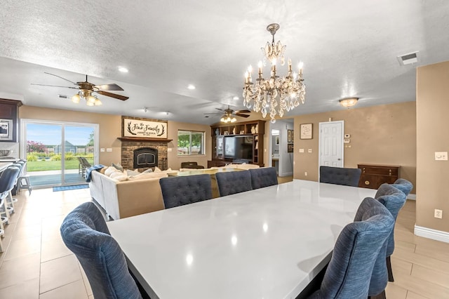 6421 S Greenwood Ave, Del Rey, CA 93616 - dining room featuring ceiling fan, a chandelier, plenty of natural light, a fireplace, and recessed lighting