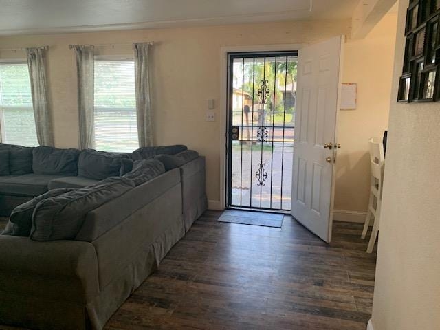 3614 E Washington Ave, Fresno, CA 93702 - foyer featuring dark wood-style floors and baseboards