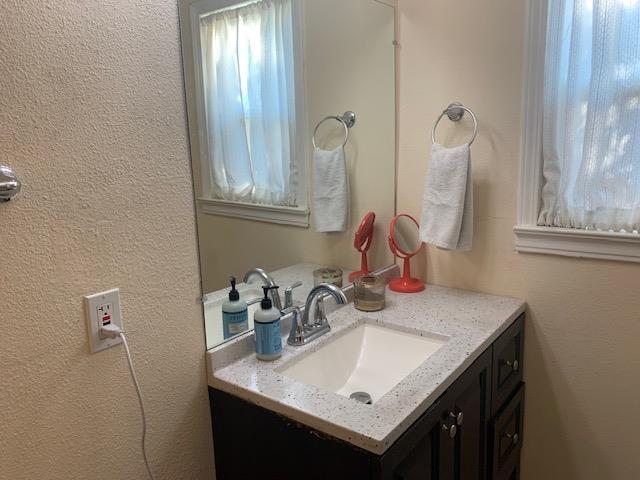 3614 E Washington Ave, Fresno, CA 93702 - bathroom featuring vanity