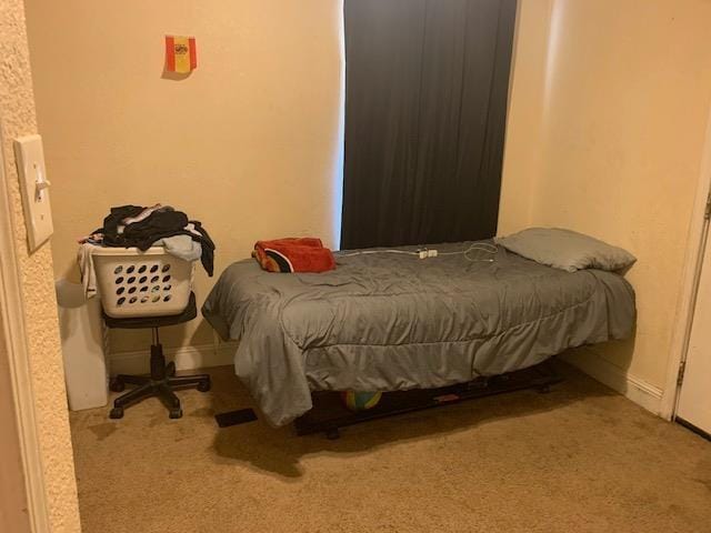3614 E Washington Ave, Fresno, CA 93702 - carpeted bedroom featuring baseboards