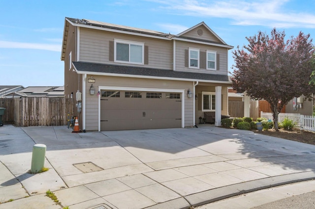 6236 E Garland Ave, Fresno, CA 93727 - traditional-style home featuring concrete driveway and an attached garage