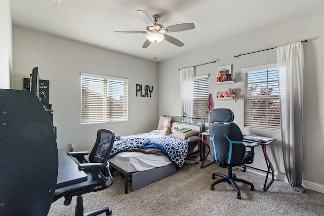 6236 E Garland Ave, Fresno, CA 93727 - carpeted bedroom with an office area and a ceiling fan
