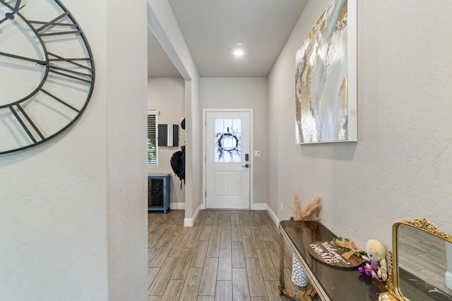 6236 E Garland Ave, Fresno, CA 93727 - foyer featuring wood finished floors and baseboards
