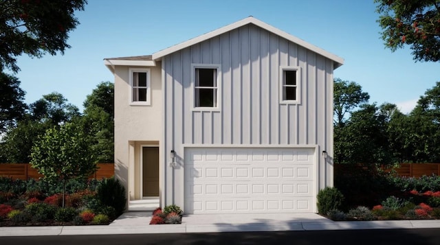 4090 Brent Rd, Madera, CA 93636 - view of front of home with board and batten siding and a garage