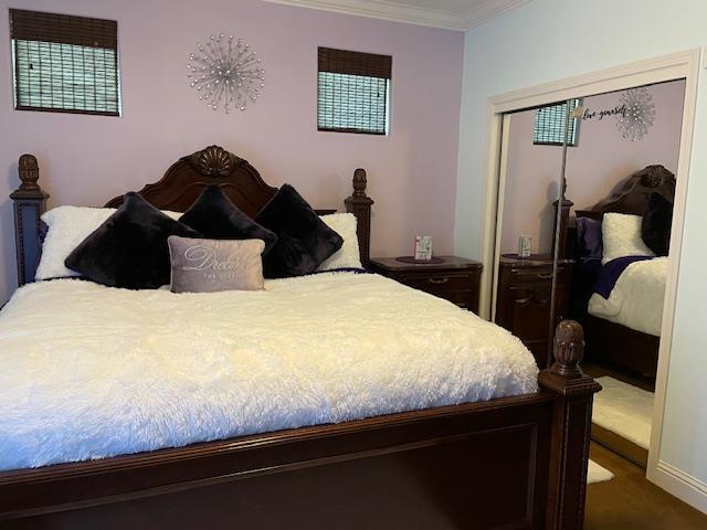 2291 E Prestwick Ave, Fresno, CA 93730 - bedroom with a closet and crown molding