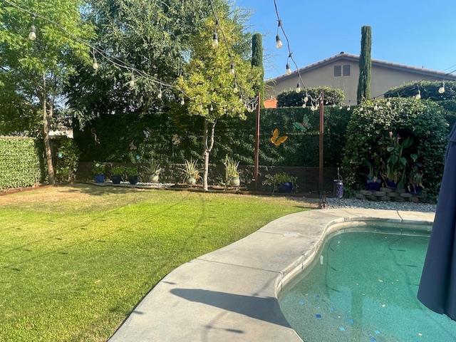 2291 E Prestwick Ave, Fresno, CA 93730 - view of pool featuring a fenced backyard